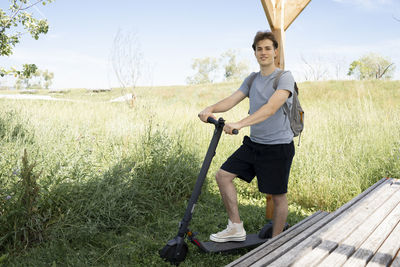 Full length of man standing on field