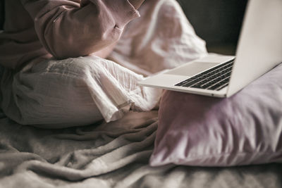 Close-up of laptop on table at home