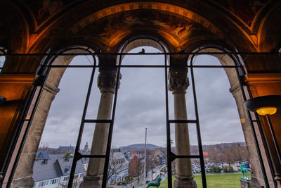 Low angle view of sky seen through window