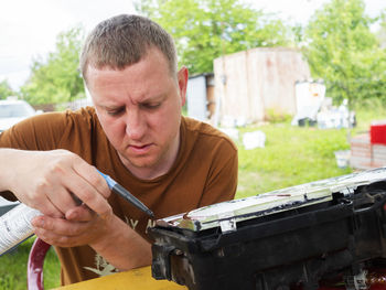 Man working on wood