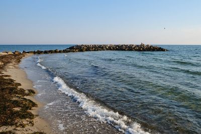 Scenic view of sea against clear sky