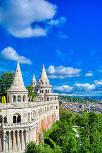 Buildings against blue sky