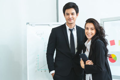 Portrait of a smiling young couple