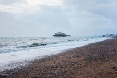 Scenic view of beach against sky