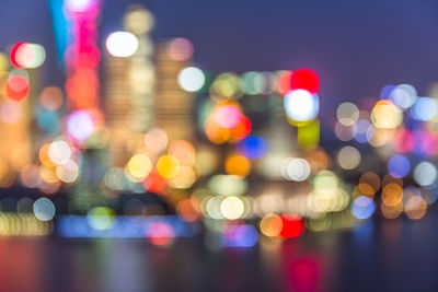 Defocused image of illuminated lights at night