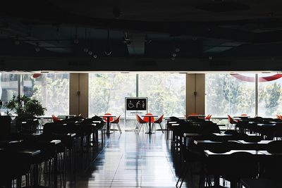 Chairs and table against window