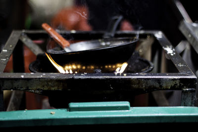 Close-up of fire on barbecue grill