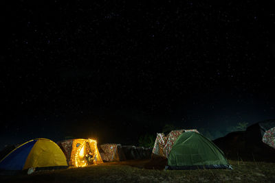 Scenic view of mountains against sky at night