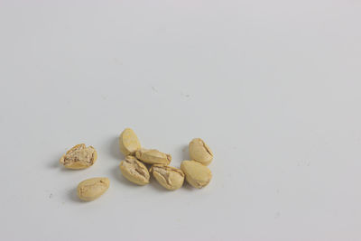 High angle view of food on table against white background