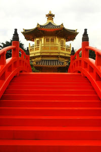 Low angle view of red building against sky