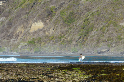 Young man at the beach, sumbawa,indonesia