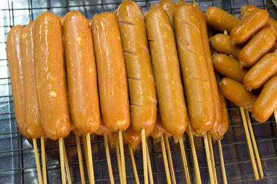 High angle view of meat on barbecue grill