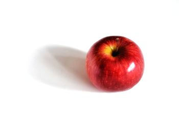 Close-up of apple against white background
