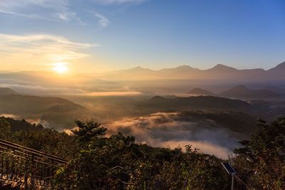 Scenic view of landscape against sky during sunset