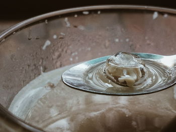 Close-up of water in glass on table