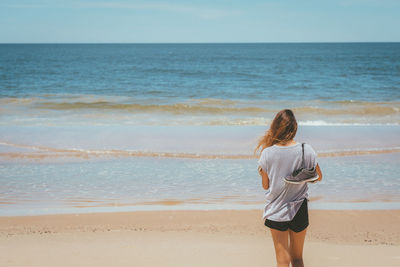 Blond girl on the beach 