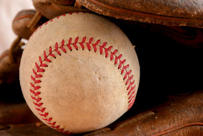 Close-up of ball and gloves