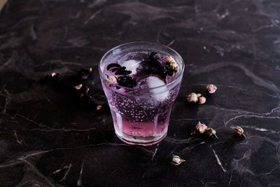 High angle view of drink in glass on table