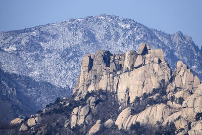 Low angle view of mountains against sky