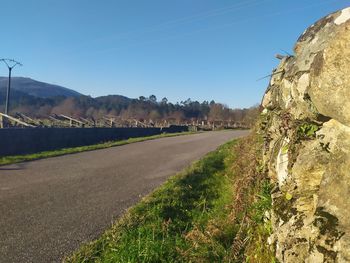 Scenic view of landscape against blue sky