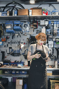 Woman working on shopping cart