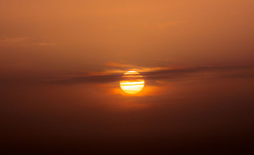 Scenic view of sea against romantic sky at sunset