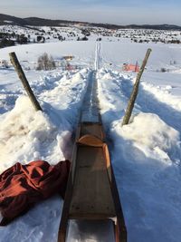 High angle view of snow covered mountain against sky