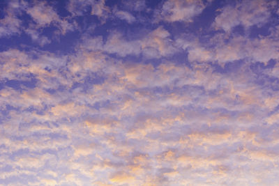 Low angle view of cloudy sky during sunset