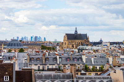 Aerial city landscape of paris, lots of roofs characteristic roofs and chimney