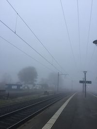 View of railway tracks in foggy weather