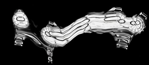 Low angle view of illuminated lights at night