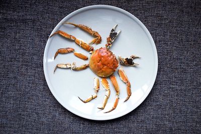High angle view of crab served in plate on table