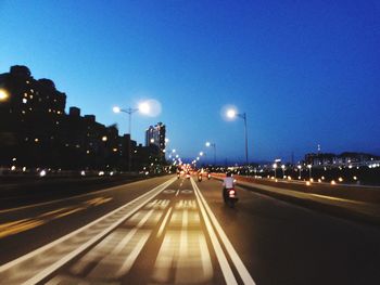 Illuminated street light at night