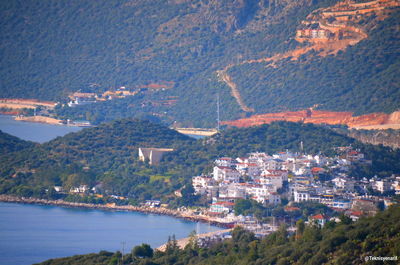 High angle view of sea and buildings in city