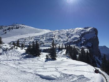 Snowcapped mountains against clear sky