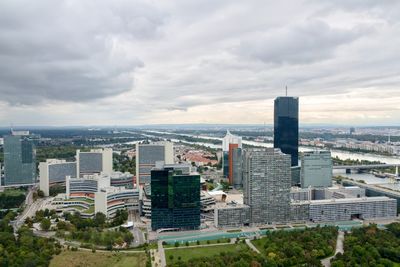 High angle view of buildings in city against sky