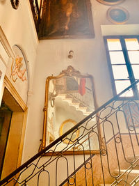 Low angle view of spiral staircase in building