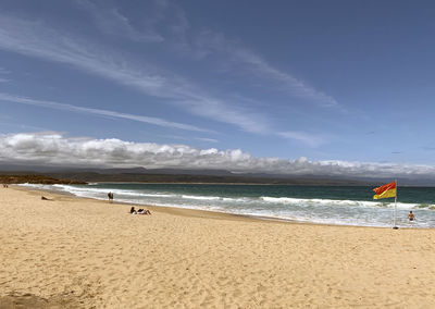 Scenic view of beach against sky