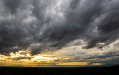 Storm clouds over landscape