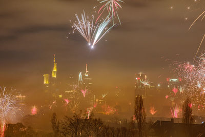 Firework display at night