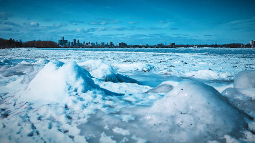 Detroit skyline with frozen water in the foreview