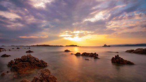 Scenic view of sea against sky during sunset