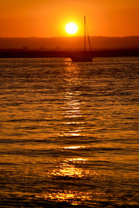 Scenic view of sea at sunset