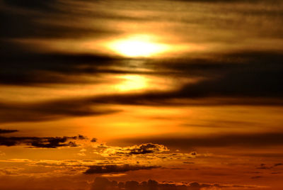 Scenic view of dramatic sky during sunset