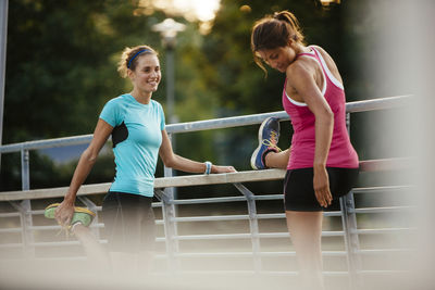 Young women stretching, uppsala, sweden