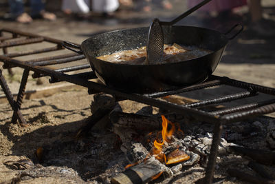 High angle view of bonfire on barbecue grill