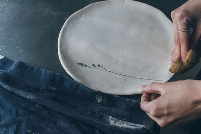 Woman making plate