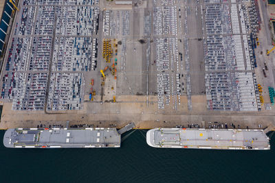 High angle view of road by buildings in city