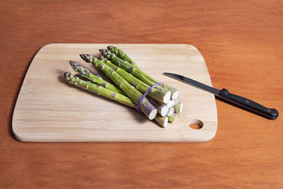 High angle view of chopped vegetables on cutting board