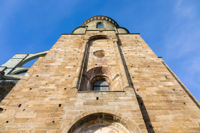 Low angle view of old building against sky